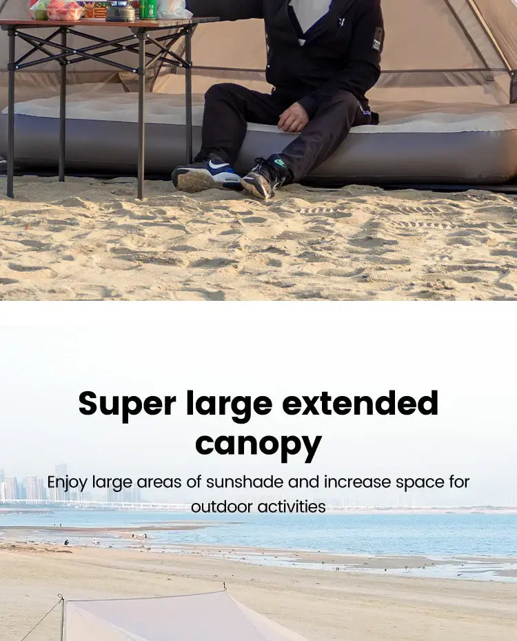 Man enjoying a picnic under a large camping tent canopy on the beach, ideal for outdoor activities and sunshade.